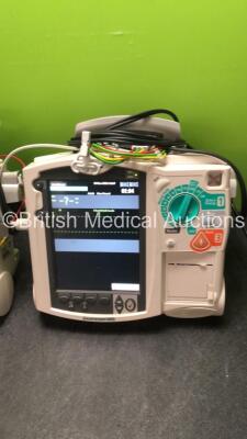 2 x Philips MRx Defibrillators Including ECG and Printer Options with 2 x Philips M3539A Power Adapters 2 x Paddle Lead, and 2 x 3 Lead ECG Leads (Both Power Up) *US00546536, US005747548* - 3
