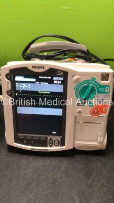 2 x Philips MRx Defibrillators Including ECG and Printer Options with 2 x Philips M3539A Power Adapters 2 x Paddle Lead, and 2 x 3 Lead ECG Leads (Both Power Up, 1 with Damaged Screen-See Photo) *US00546555, US00546538* - 2