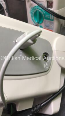 2 x Philips MRx Defibrillators Including ECG and Printer Options with 2 x Philips M3539A Power Adapters 2 x Paddle Lead, and 2 x 3 Lead ECG Leads (Both Power Up, 1 with Damaged Screen-See Photo) *US00546555, US00546538* - 6