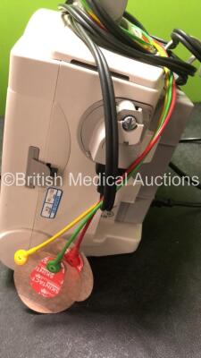 2 x Philips MRx Defibrillators Including ECG and Printer Options with 2 x Philips M3539A Power Adapters 2 x Paddle Lead, and 2 x 3 Lead ECG Leads (Both Power Up) *US00546535, US00546531* - 8