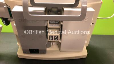 1 x Philips MRx Defibrillator Including ECG and Printer Options with 1 x Philips M3539A Power Adapter and 1 x Philips M3538A Battery 1 x Paddle Lead, 1 x Philips M3725A Test Load1 and 1 x 3 Lead ECG Lead (Powers Up) *US00546518* - 3