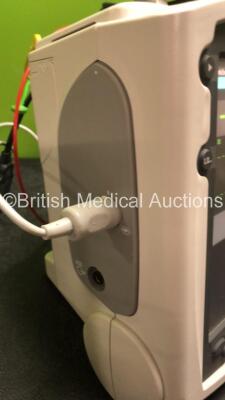 2 x Philips MRx Defibrillators Including ECG and Printer Options with 2 x Philips M3539A Power Adapters 2 x Paddle Lead, and 2 x 3 Lead ECG Leads (Both Power Up) *US00565620, US003151575* - 3
