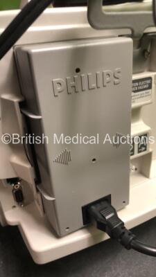 2 x Philips MRx Defibrillators Including ECG and Printer Options with 2 x Philips M3539A Power Adapters 2 x Paddle Lead, and 2 x 3 Lead ECG Leads (Both Power Up) *US00565620, US003151575* - 6