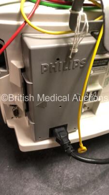 2 x Philips MRx Defibrillators Including ECG and Printer Options with 2 x Philips M3539A Power Adapters 2 x Paddle Lead, and 2 x 3 Lead ECG Leads (Both Power Up) *US00546452, US00546540* - 6