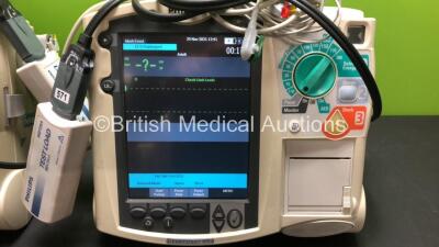 2 x Philips MRx Defibrillators Including Pacer, ECG and Printer Options with 2 x Philips M3539A Power Adapters and 2 x Philips M3538A Batteries 2 x Paddle Lead, 2 x Philips M3725A Test Loads and 2 x 3 Lead ECG Leads (Both Power Up) *US00546523 - US0032222 - 2