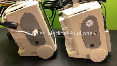 2 x Philips MRx Defibrillators Including Pacer, ECG and Printer Options with 2 x Philips M3539A Power Adapters and 2 x Philips M3538A Batteries 2 x Paddle Lead, 2 x Philips M3725A Test Loads and 2 x 3 Lead ECG Leads (Both Power Up) *US00546523 - US0032222 - 4