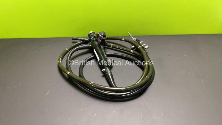 Olympus CF-T10L Colonoscope - Engineer's Report : Optical System - Excessive Broken Fibers and Severe Fluid Stain, Angulation - Not Reaching Specification, Play in Controls, Bending Section Strained, Insertion Tube - Severely Kinked, Light Transmission -