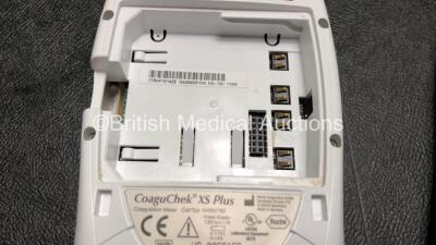 3 x Roche CoaguChek XS Plus Blood Monitoring Units with 1 x AC Power Supply (All Power Up, 2 with System Error and 1 with Faulty Screen and Missing Battery-See Photos) *RI* - 5