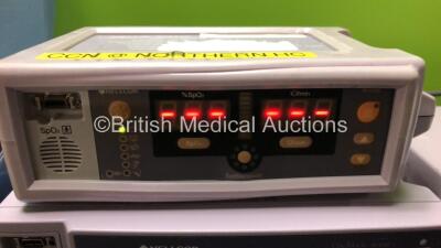 Mixed Lot Including 3 x Nellcor Oximeters (1 x N-600, 1 x N-595 Both Power Up with EEE529 and 1 x N-560 Powers Up) 1 x KCI Info V.A.C. Negative Pressure Wound Therapy System (Damaged Handle - See Photo) 1 x Ivac Pressure Gauge in Case and 1 x Omron M5-I B - 2