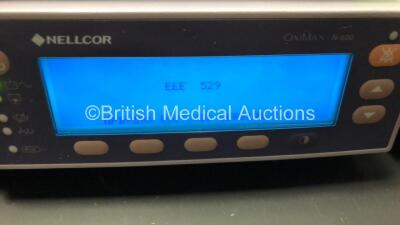 Mixed Lot Including 3 x Nellcor Oximeters (1 x N-600, 1 x N-595 Both Power Up with EEE529 and 1 x N-560 Powers Up) 1 x KCI Info V.A.C. Negative Pressure Wound Therapy System (Damaged Handle - See Photo) 1 x Ivac Pressure Gauge in Case and 1 x Omron M5-I B - 3