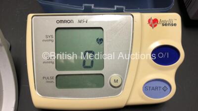 Mixed Lot Including 3 x Nellcor Oximeters (1 x N-600, 1 x N-595 Both Power Up with EEE529 and 1 x N-560 Powers Up) 1 x KCI Info V.A.C. Negative Pressure Wound Therapy System (Damaged Handle - See Photo) 1 x Ivac Pressure Gauge in Case and 1 x Omron M5-I B - 4