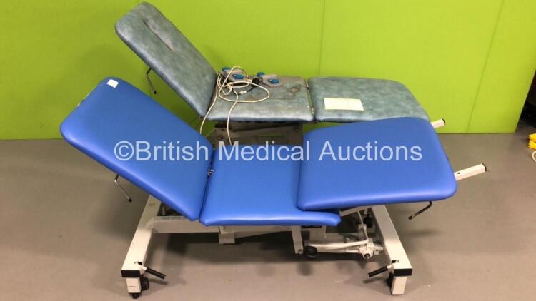 1 x Plinth Co Hydraulic Patient Examination Couch (Hydraulics Tested Working - Headrest Mech Faulty - Bottom Cushion Loose - See Pictures) and 1 x Plinth Co Electric Patient Examination Couch with Foot Controller (No Power) *S/N FS0171270*