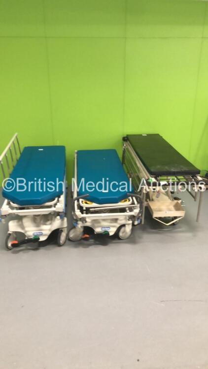 2 x Hill-Rom Transtar Hydraulic Patient Trolleys with Mattresses and 1 x Huntleigh Nesbit Evans Hydraulic Patient Trolley (Hydraulics Tested Working) * SN 116220 / HRP002217577 / HRP002033120 *