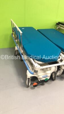 2 x Hill-Rom Transtar Hydraulic Patient Trolleys with Mattresses and 1 x Huntleigh Nesbit Evans Hydraulic Patient Trolley (Hydraulics Tested Working) * SN 116220 / HRP002217577 / HRP002033120 * - 2