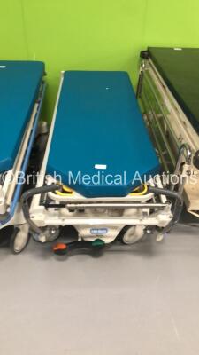 2 x Hill-Rom Transtar Hydraulic Patient Trolleys with Mattresses and 1 x Huntleigh Nesbit Evans Hydraulic Patient Trolley (Hydraulics Tested Working) * SN 116220 / HRP002217577 / HRP002033120 * - 3