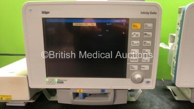 2 x Drager Infinity Delta Patient Monitors with HemoMed 1, Aux - Hemo 2 and 3, MultiMed and SpO2 Options *Mfd 2009 - 2009* with 2 x Drager Power Supplies and 2 x Docking Stations (Both Power Up) *SN 6000965469, 6000967467* - 2