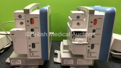 2 x Drager Infinity Delta Patient Monitors with HemoMed 1, Aux - Hemo 2 and 3, MultiMed and SpO2 Options *Mfd 2009 - 2009* with 2 x Drager Power Supplies and 2 x Docking Stations (Both Power Up) *SN 6000965469, 6000967467* - 4