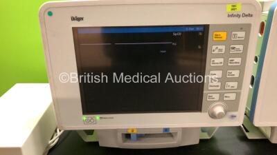 2 x Drager Infinity Delta Patient Monitors with HemoMed 1, Aux - 1 x Hemo 2 and 2 x Hemo 3, MultiMed and SpO2 Options *Mfd 2012 - 2009* with 2 x Drager Power Supplies and 2 x Docking Stations (Both Power Up) *6004575169 - 6000965968* - 3