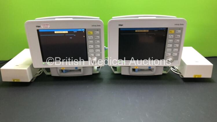 2 x Drager Infinity Delta Patient Monitors with HemoMed 1, Aux - Hemo 3, MultiMed and SpO2 Options *Mfd 2012 - 2005* with 2 x Drager Power Supplies and 2 x Docking Stations (Both Power Up) *5395828451 - 6004540670*