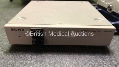 Mixed Lot Including 1 x Dyonics Intellijet Arthroscopic Fluid Management System (Powers Up) 1 x Dyonics Power Console (No Power) 1 x Sony CMA-D2 Camera Adapter (Powers Up) 1 x Carefusion IVAC PCAM Pump (Holds Power Blank Screen) - 5