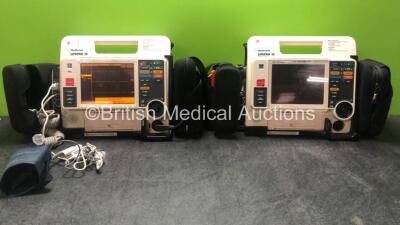 2 x Medtronic Physio-Control Lifepak 12 Biphasic 12 Lead Defibrillators / Monitors with CO2, SPO2, NIBP, ECG and Printer Options, 1 x SpO2 Finger Sensor, 1 x NIBP Hose and BP Cuff and 1 x Battery (Both Power Up with Stock Batteries, 1 x Battery Included, 