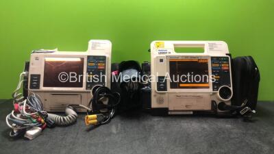 2 x Medtronic Physio-Control Lifepak 12 Biphasic 12 Lead Defibrillators / Monitors with CO2, SPO2, NIBP, ECG and Printer Options, 2 x SpO2 Finger Sensors, 2 x NIBP Hoses, 2 x SpO2 Finger Sensors and 2 x Batteries (1 Powers Up, 1 Spares and Repairs with Da