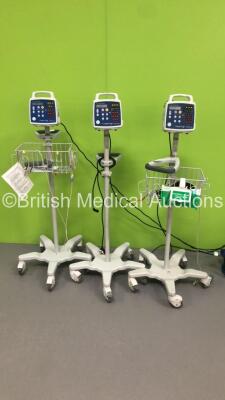 3 x CSI Criticare Comfort Cuff Vital Signs Monitors on Stands (All Power Up - 1 x Loose Surround)