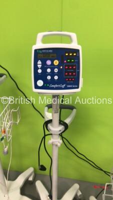 3 x CSI Criticare Comfort Cuff Vital Signs Monitors on Stands (All Power Up - 1 x Loose Surround) - 3