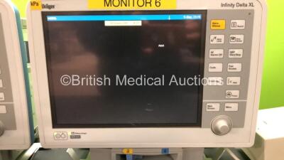 2 x Drager Infinity Delta XL Patient Monitors with HemoMed 1, Aux/Hemo 2, Aux/Hemo 3, NBP and MultiMed Options, 2 x Docking Stations and 2 x Power Supplies *Mfd 2009* (Both Power Up) - 2