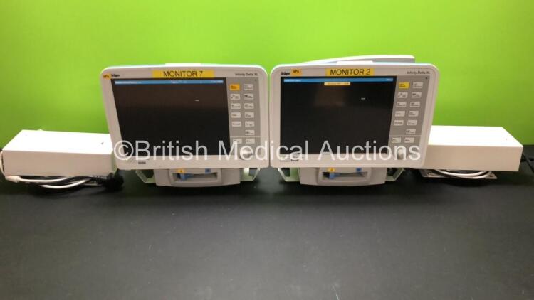 2 x Drager Infinity Delta XL Patient Monitors with HemoMed 1, Aux/Hemo 2, Aux/Hemo 3, NBP and MultiMed Options, 2 x Docking Stations and 2 x Power Supplies *Mfd 2009* (Both Power Up)