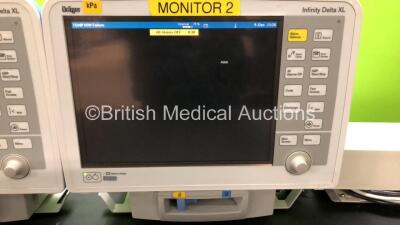 2 x Drager Infinity Delta XL Patient Monitors with HemoMed 1, Aux/Hemo 2, Aux/Hemo 3, NBP and MultiMed Options, 2 x Docking Stations and 2 x Power Supplies *Mfd 2009* (Both Power Up) - 2