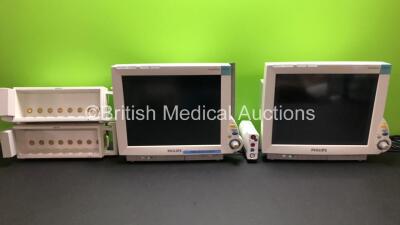 2 x Philips IntelliVue MP70 Anesthesia Patient Monitors with 1 x Philips M3001A Patient Module with ECG/Resp, SpO2, NBP, Press/Temp Options *Mfd 2009* and 2 x Philips M8048A Module Racks (Both Power Up)