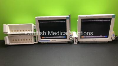 2 x Philips IntelliVue MP70 Anesthesia Patient Monitors with 1 x Philips M3001A Patient Module with ECG/Resp, SpO2, NBP, Press/Temp Options *Mfd 2009* and 2 x Philips M8048A Module Racks (Both Power Up)