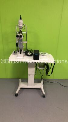 Topcon SL-D7 Slit Lamp with 2 x 12.5x Eyepieces and DV-3 Attachment on Topcon ATE-600 Motorized Table (Powers Up) * SN 1700339 * * Mfd 2011 *