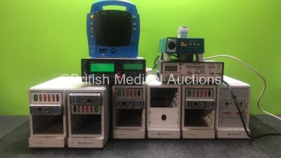 Mixed Lot Including 6 x Tram-Rac 4A Module Racks (3 x Marquette, 3 x GE) with Various Modules, 1 x GE Dinamap Procare Patient Monitor (No Power) 1 x Ohmeda Biox 3700e Pulse Oximeter (Powers Up) 1 x enFlow Controller Model 121 (Powers Up) 1 x Thurlby Thand