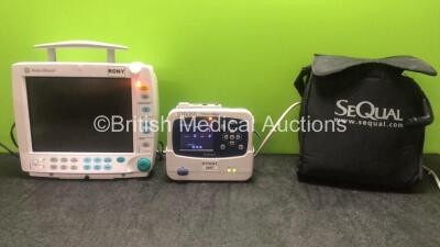 Mixed Lot Including 1 x Datex Ohmeda F-FM-01 Patient Monitor with 2 x SM 201-6 Batteries (Powers Up with Blank Display-See Photo) 1 x Welch Allyn Propaq LT Vital Signs Monitor with 1 x Charging Cradle (Powers Up-Power Supply Not Included) and 2 x Sequel A