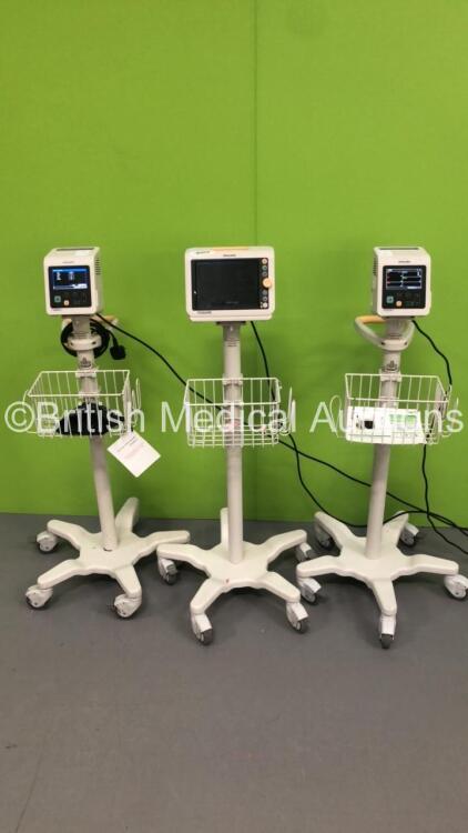 2 x Philips SureSigns VSI Patient Monitors on Stands and 1 x Philips SureSigns VM4 Patient Monitor on Stand (All Power Up)