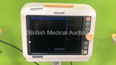 2 x Philips SureSigns VSI Patient Monitors on Stands and 1 x Philips SureSigns VM4 Patient Monitor on Stand (All Power Up) - 4