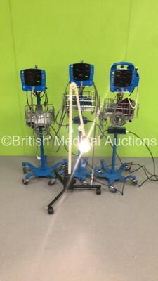 Mixed Lot Including 2 x GE Carescape V100 Patient Monitors on Stands with 2 x BP Hoses and 1 x SpO2 Finger Sensor,1 x GE ProCare Auscultatory 400 Patient Monitor on Stand with 1 x BP Hose and 1 x SpO2 Finger Sensor and 1 x Daray Patient Examination Light 