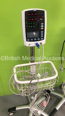 2 x Mindray VS-800 Patient Monitors on Stands with 2 x BP Hoses and 2 x SpO2 Finger Sensors (Both Power Up-1 x Missing Light Lens-See Photos) * SN BY72-A3431P / BY-12125126 * - 4