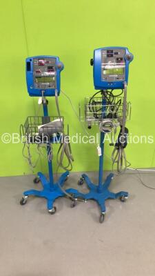 1 x GE Pro 400 Patient Monitor on Stand with 1 x SpO2 Finger Sensor and 1 x BP Hose and 1 x GE Pro 300V2 Patient Monitor on Stand with 1 x BP Hose and 1 x SpO2 Finger Sensor (Both Power Up) * SN 2018870-001 / 010M1279004 *