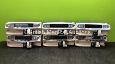 6 x Carefusion Alaris GH Infusion Pumps (All Power Up with Service Message-See Photos) *SN 800224073, 80023UN01, 800224078, 800224161, 800206869, 800208087*