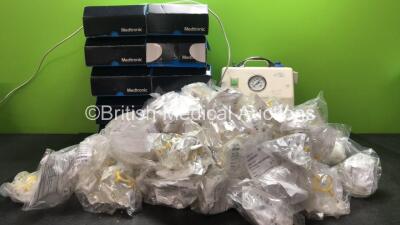 Mixed Lot Including Large Quantity of Hudson Sure Seal Air Cushion Masks, 10 x Medtronics Mycarelink Monitors and 1 x SAM 12 Suction Unit