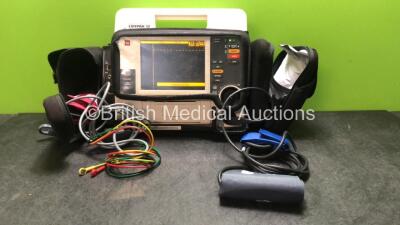 Medtronic Physio Control Lifepak 12 Biphasic Defibrillator / Monitor Including ECG, SpO2, NIBP and Printer Options with 1 x Physio Control Ref 11111-000019 4 Lead ECG Lead, 1 x Trunk Lead , and 1 x SpO2 Finger Sensor in Carry Case (Powers Up-Batteries Not