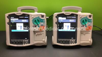 2 x Philips Heartstart MRx Defibrillator Including Pacer, ECG and Printer Options with 2 x Philips M3539A Power Adapter and 2 x Philips M3538A Batteries (Both Power Up)