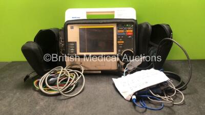 Medtronic Physio Control Lifepak 12 Biphasic Defibrillator / Monitor Including ECG, SpO2, NIBP and Printer Options with 1 x Physio Control Ref 11111-000019 4 Lead ECG Lead, 1 x Trunk Lead , and 1 x Defibrillator in Carry Case (Powers Up with Damaged Hand