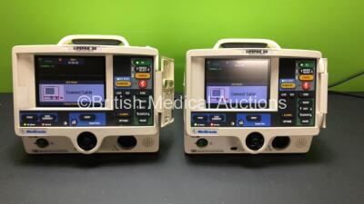 2 x Lifepak 20 Defibrillators / Monitors *Mfd 2002 - 2002* Including ECG, Pacer and Printer Options (Both Power Up with Service Lights) *30710328 - 30710307*