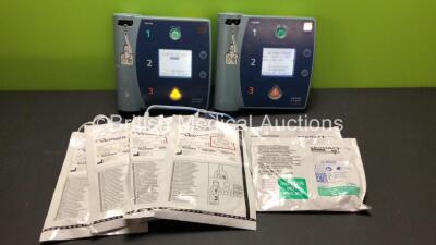 Job Lot Including 2 x Philips Heartstart FR2+ Defibrillator (Both Power Up and Pass Self Test with Stock Batteries - Not Included) and 6 x Electrode Packs Including 4 x Vermed and 2 x Skintact