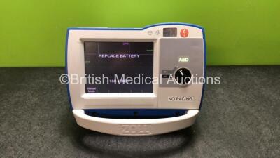 Zoll R Series Plus Defibrillator Including ECG and Printer Options with 1 x Zoll Sure Power Battery and 1 x Paddle Lead (Powers Up when Tested with Stock Battery-Battery Included Is Flat) *SN AF12B020903*