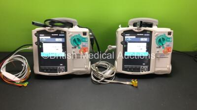 2 x Philips HeartStart MRx Defibrillators with 2 x ECG and 2 x Printer Options with 2 x M3539A Modules, 2 x ECG Leads, 2 x Paddle Leads *Mfd 2010 - 2010* (Both Power Up) *US00546537 - US00546307*